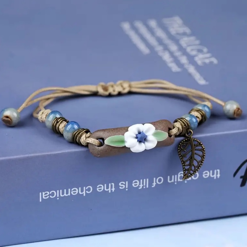 WHITE FLOWER AND BLUE ADJUSTABLE  BRACELET
